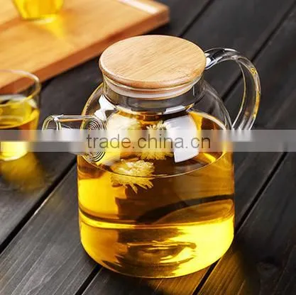 Made in China Glass Teapot Kettle With Measurement Scale Wooden Lid Handmade photo-4