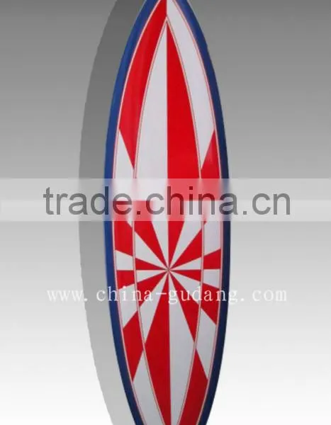 Red hypnotic design fiberglass retro surfboard