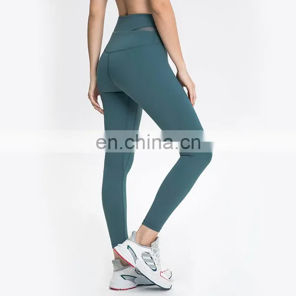 New Arrivals High Waisted Workout Gym Fitness Yoga Leggings Pants With Pockets Cross Waist and Spliced Mesh Design for Women