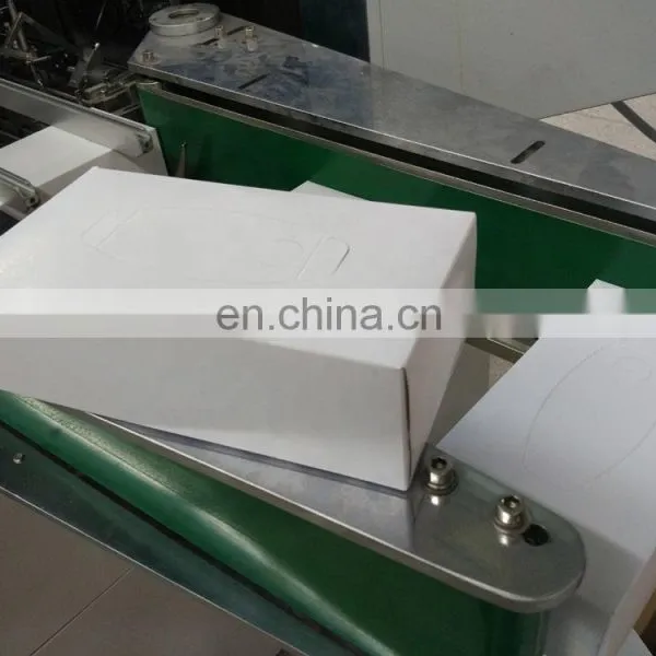 Full Automatic Facial Paper Cardboard Box Sealing Packing Machine photo-4