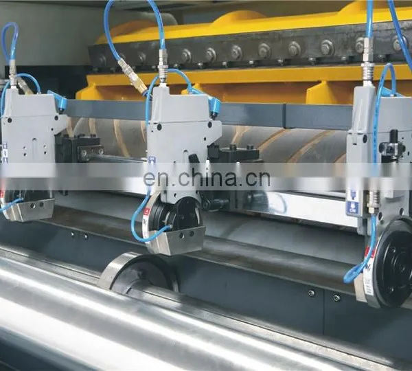 UCM1900A High Speed 4 Roll Automatic Paper Cutting Slitting Machine With Conveyor Belt Stacker photo-3