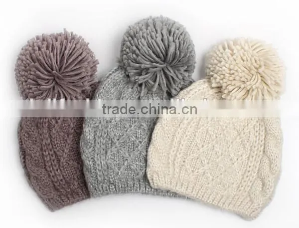 Warm knitted pom pom beanie winter hat