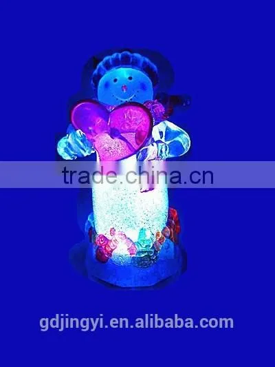 Holding a Red Heart Acrylic Snowman With LED Light photo-2