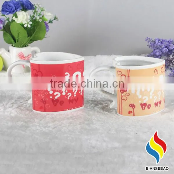 Heart Shape Ceramic Mug With Revolving Logo photo-2