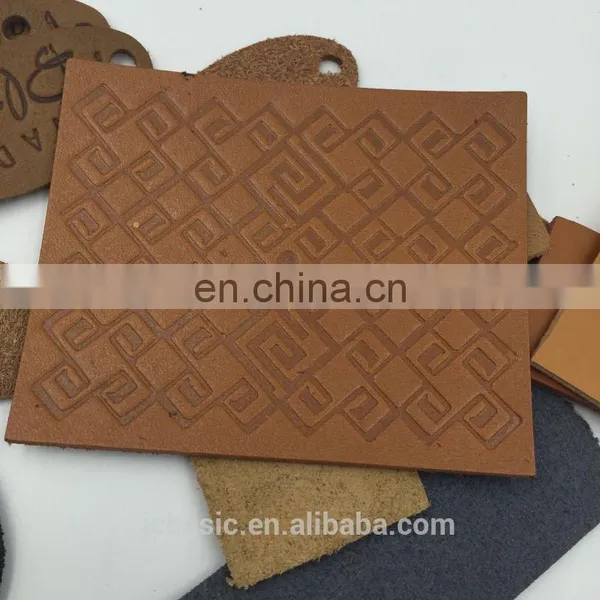 Custom Logo Embossed Genuine Leather Label for Clothing photo-4