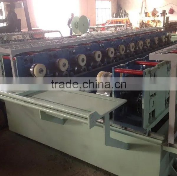 Automatic Adjustable Roller Door Box Roll Forming Machine photo-4