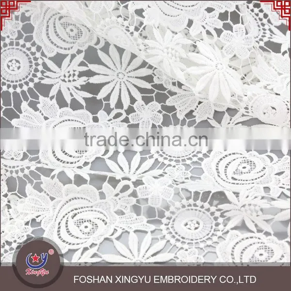OEM/ODM Manufactur Simple and Elegant Embroidered Fabric With Cutwork Embroidery for Wedding Dress photo-2