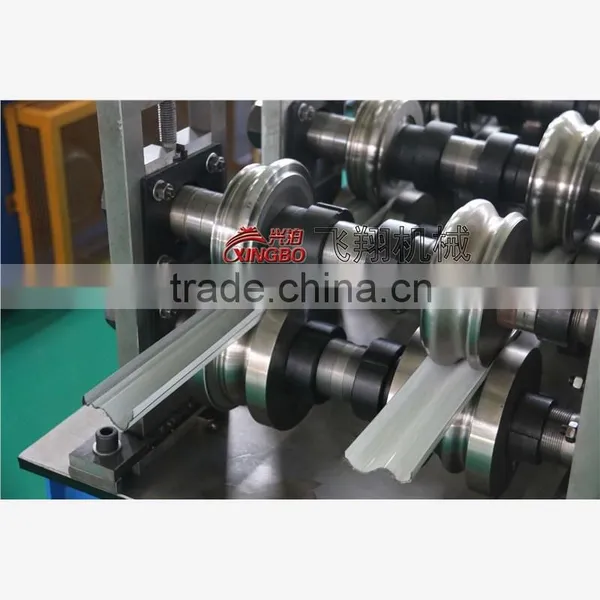 FX Hydraulic Cutting and Punching Shutter Door Roll Forming Machine photo-3