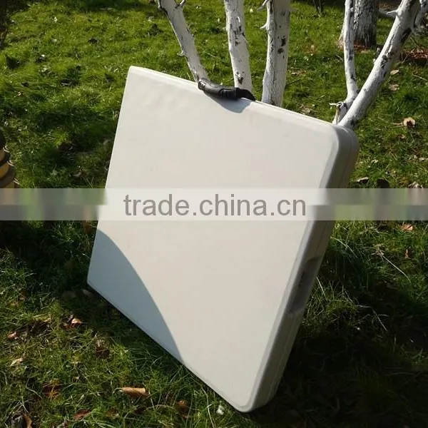 4-foot blow moulded plastic suitcase fold in half table