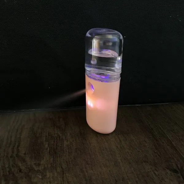 2020 Cute Beauty Care Moisture Electric Mini Handheld Moisture Spray Water Milk Alcohol Nano Mist Sprayer photo-5