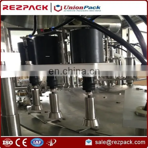 Rotary Spout Bag or Pouch Filling And Capping Machine photo-4
