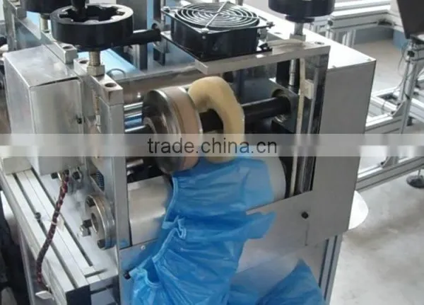 Plastic Shoe Cover Making Machinery photo-3