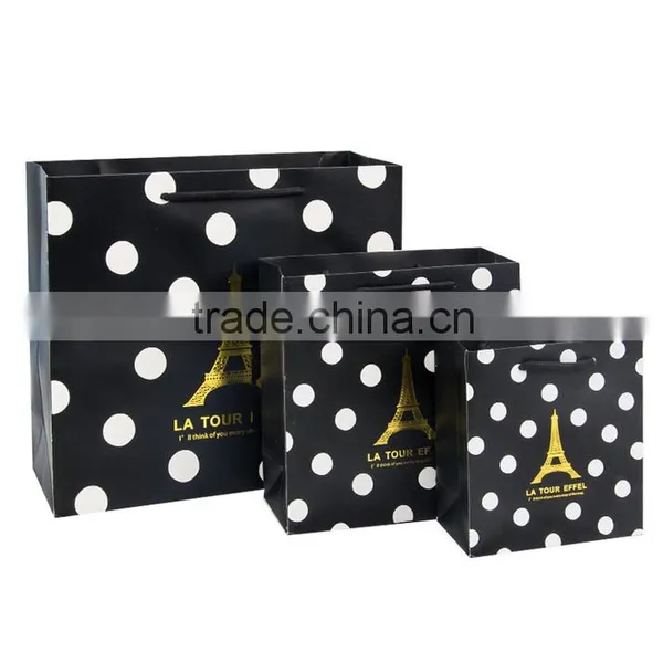 Fashionable High Brand Black Paper Gift Packaging Bag With Bronzing Tower