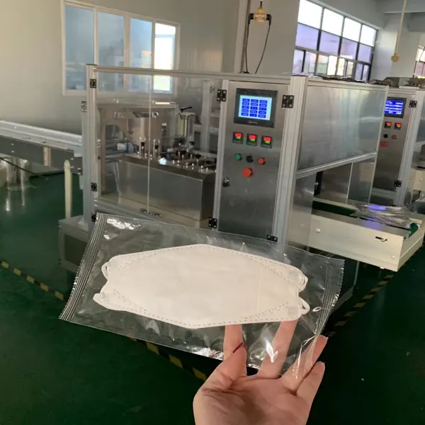 Three Servo Surgical Mask Packaging Food Packaging Machine Fully Automatic photo-3