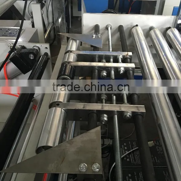 Automatic Non Woven Fabric Ultrasonic Embossing Roll to Sheets Cutting Machine photo-2