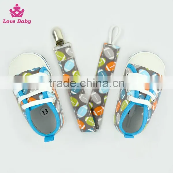 Fashion Rugby Pattern High Quality Newborn Crib Shoes Baby Shoes Matching Pacifier Clip photo-6