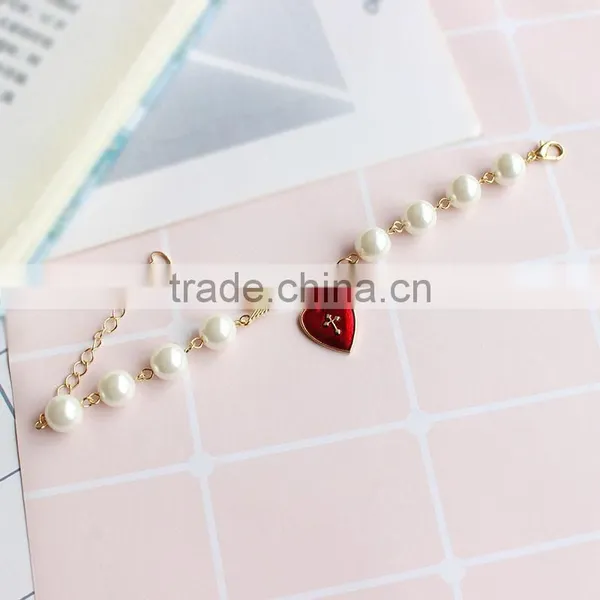 Cupid Arrow Love Bracelet Gold Arrow Red Enamel Cross Heart Charms Pearl Bead Link Bracelet photo-3