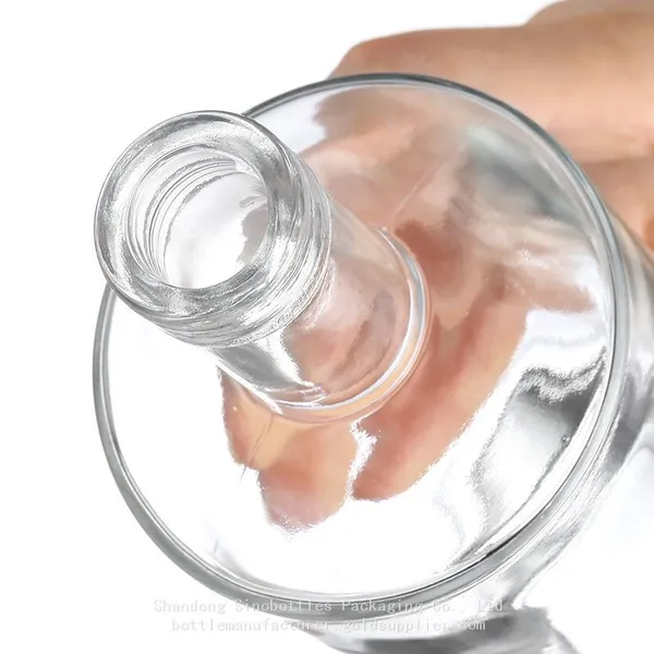 750 ML 620g Customized Round Shape Super Flint Glass Bottle for Vodka Gold Supplier SinoBottles Packaging photo-2