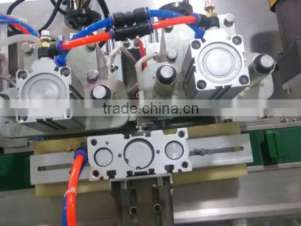 China Guangzhou GMP Standard Double Head Face Mask Making Machine photo-6