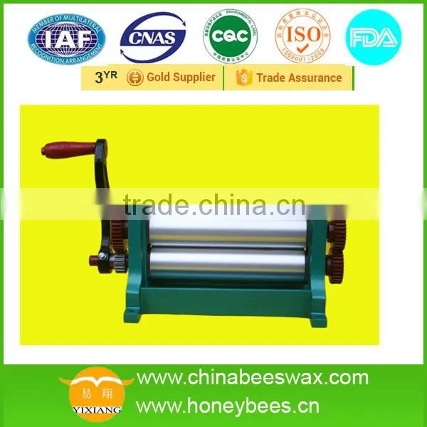 High Quality Beeswax Comb Foundation Machine photo-4