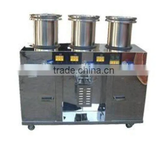 Automatic herb decocting and packaging machine