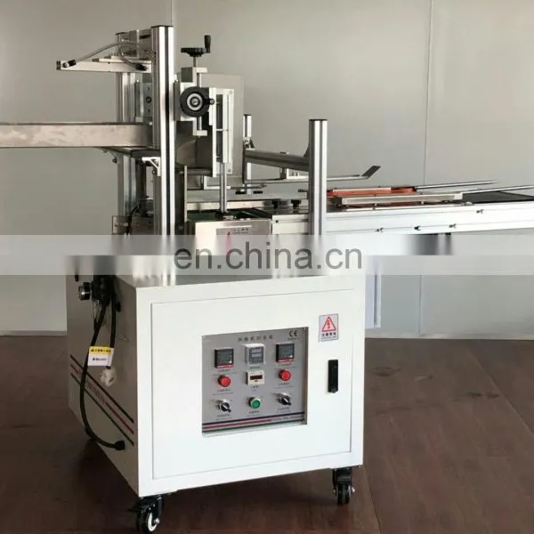 Low Price Semi Automatic Facial Tissue Carton Box Packing Machine photo-3