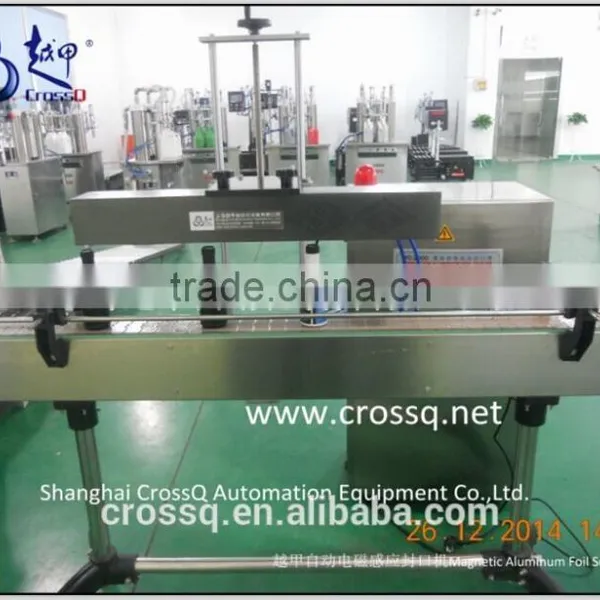 Automatic Magnetic Aluminum Foil Sealing Machine For Color Addictive Liquid Cans photo-3