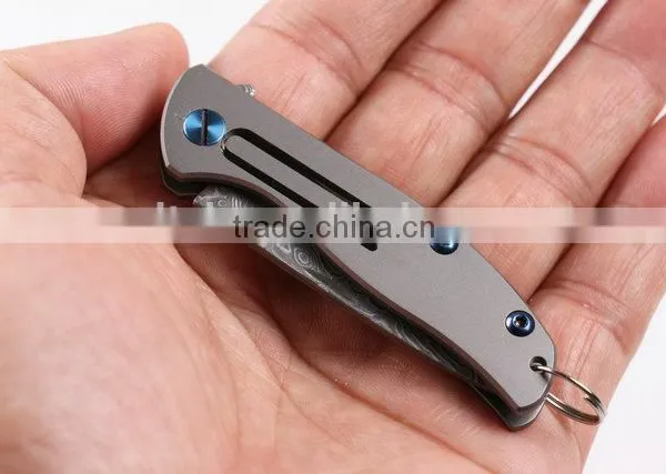 OEM Titanium Alloy Handle Material and Damascus Blade Material Folding Knife photo-5