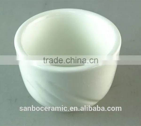 White Porcelain Cup With Embossed Wave Design photo-2