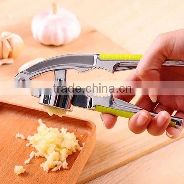 Wholesale Price Multi-purpose Stainless Steel Garlic Presser ABS Handle Green /black Garlic Press Peeler