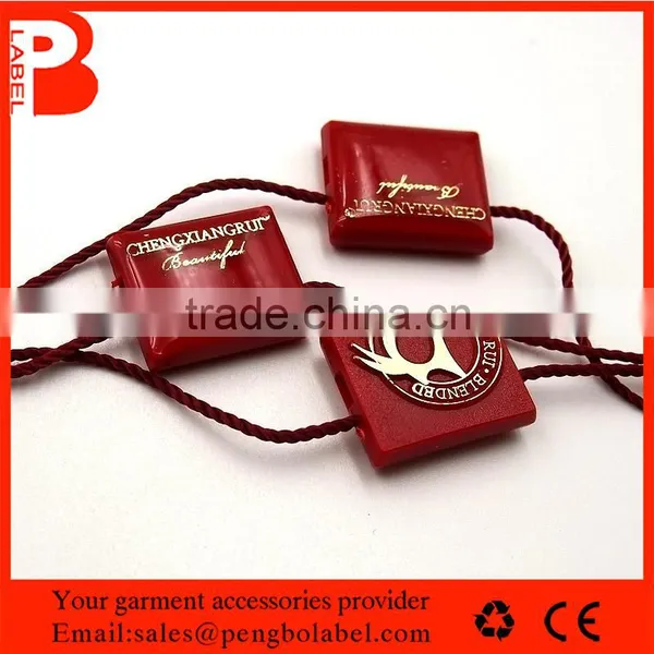 Eco-friendly Custom Printing Embossed Plastic Seal Tags for Jeans photo-2
