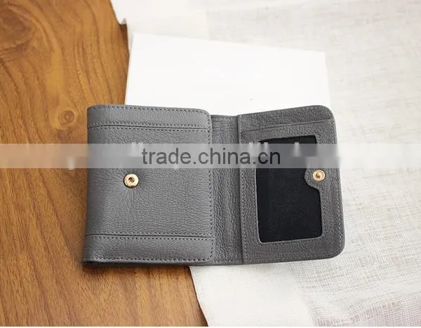 Guangzhou Factory Cowhide Leather Hand Pouch Short Wallet Triple Wallet for Ladies photo-5