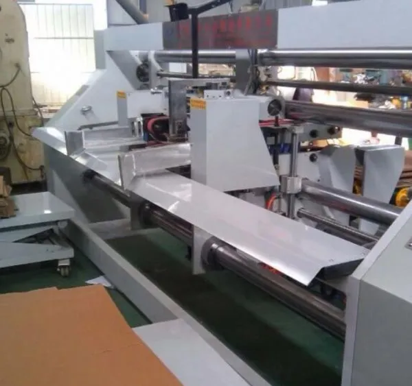 Manual Servo Model Double Head Box Stitching Machine photo-4