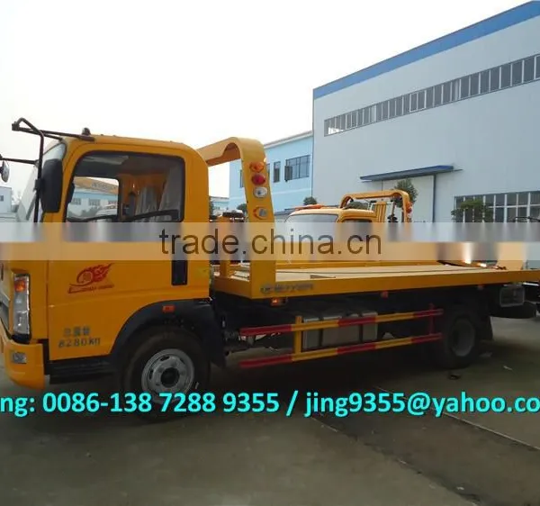 HOWO 3800mm Wheelbase Cheap Wrecker Tow Truck, L5600*W2300 Flatbed Wrecker Towing Truck on Sale in Africa photo-4
