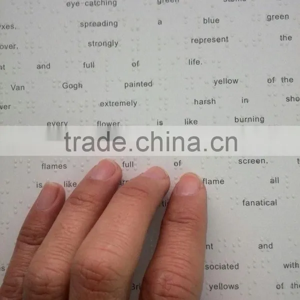 Book in Braille, cards in Braille, sticker in Braille
