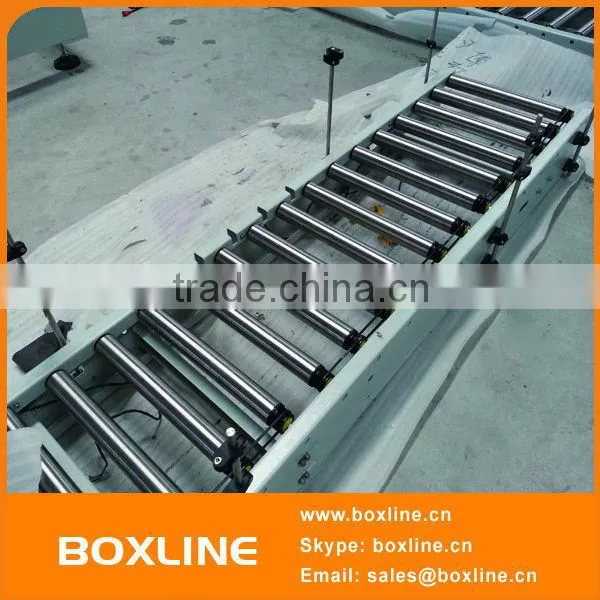 Gravity roller assembly conveyor