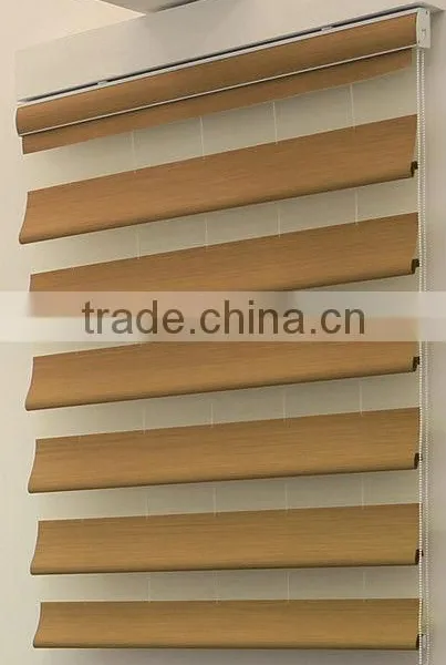 Peacock shade rolling roman shade