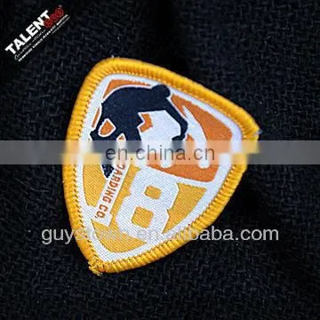 Custom Laser Cut Overlocking Bordure Shaped Woven Badge for Uniform Garment photo-5