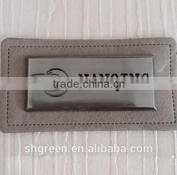 Promotional White Real Leather Label With Engraved Logo Metal Plate photo-2