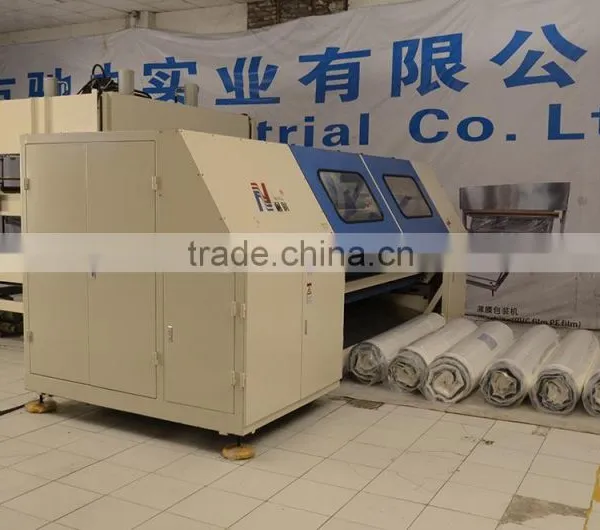 China NaiGu Factory Manufacturing High Efficient Automatic Mattress Compression and Roll Packing Machine 17R photo-2