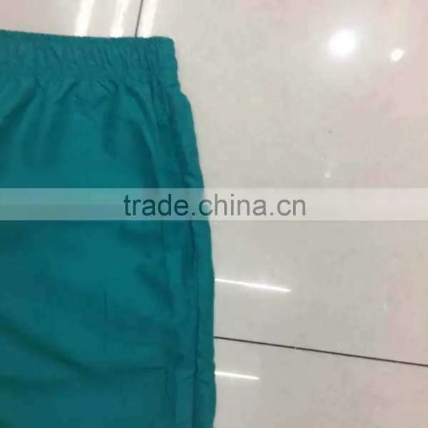 China Stocklots Men 100%polyester Pure Color Bermuda Shorts photo-3