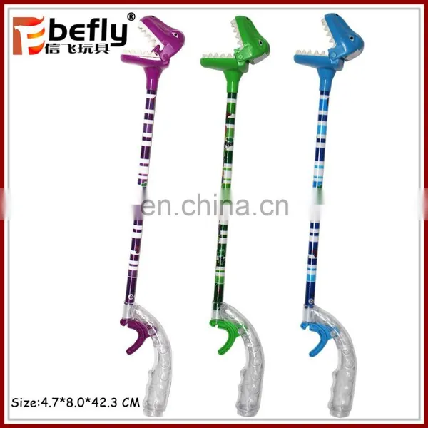 Wholesale Funny Game Plastic Dinosaur Grabber Toy With Candy Filled photo-2