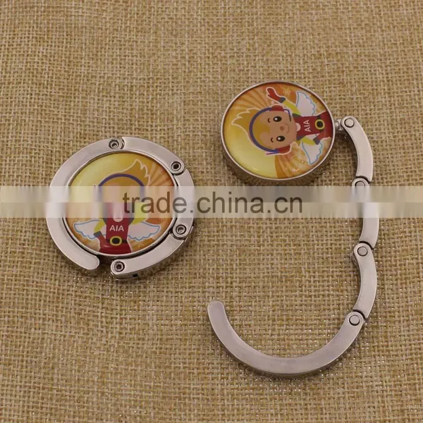 Custom Logo Printed Metal Purse Hanger /Round Bag Hanger With Soft Epoxy photo-3
