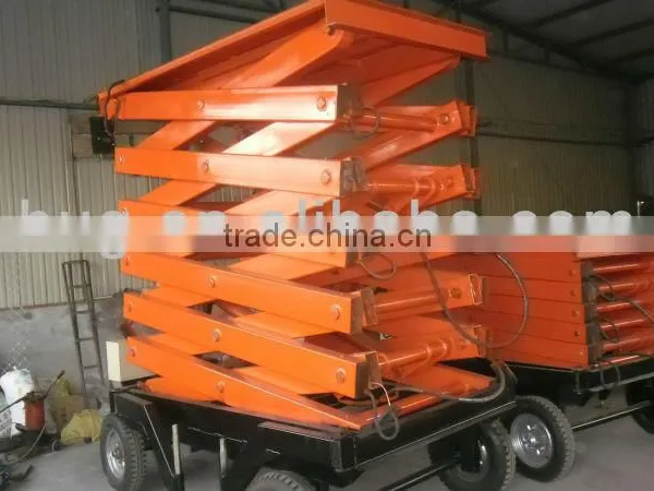 Good Quality Adjustable Mobile Scissor Lift /moving Platform With With Four Wheels photo-4