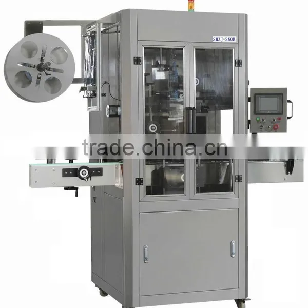 AUTOMATIC SLEEVE LABELLING MACHINE