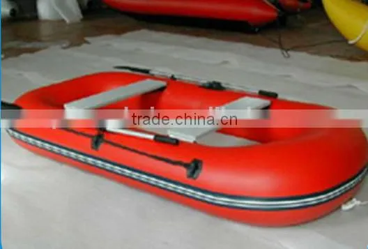 Red Drifting Boat With One Pair of Oars for Summer Sport
