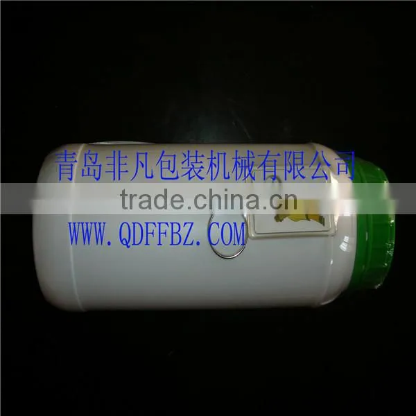 PLC Control Automatic Pesticide Bottle Heat Shrink Wrapping Machine photo-5