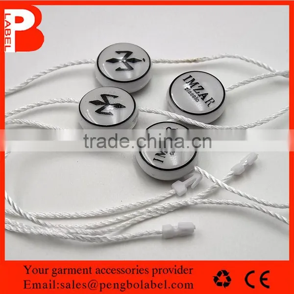 Fashion Design Embossed Color Round Shape Garment Seal Tag photo-3