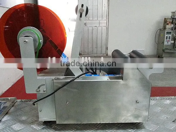 Semi-automatic Xylitol Round Wine Bottle Labeling Machine photo-2