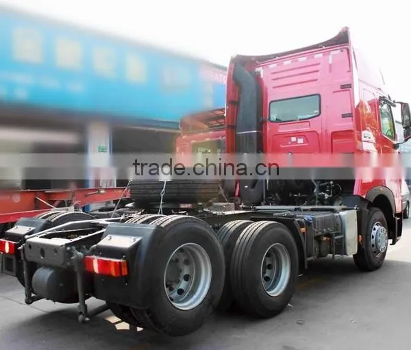 SINOTRUK HOWO T7H 6X2 440HP Euro4 MAN Engine Tractor Head Truck With Rear Axle Lifting photo-3